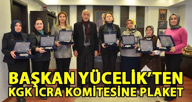 BAŞKAN YÜCELİK’TEN KGK İCRA KOMİTESİNE PLAKET